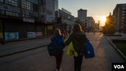 The children arrive in Kharkiv for the first time since they left their hometown in eastern Ukraine to live in Russia during the fall last year. Kharkiv, Ukraine, April 10, 2023. (Yan Boechat/VOA)