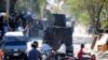 An armored police car patrols the streets in Port-au-Prince, Haiti, Jan. 26, 2024. Haiti's government on Jan. 29 announced a crackdown on a state environmental department whose heavily armed agents were blamed for violent clashes with police last week. 