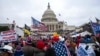 FILE - Supporters of President Donald Trump rally at the U.S. Capitol in Washington on Jan. 6, 2021. 