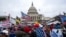 FILE - Supporters of President Donald Trump rally at the U.S. Capitol in Washington on Jan. 6, 2021. 
