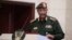 FILE - Sudan's Army chief Gen. Abdel-Fattah Burhan speaks in Khartoum, Dec. 5, 2022. Burhan accused, Aug. 13, 2023, the Rapid Support Forces and Commander Mohammed Hamdan Dagalo of committing violations under the falsehood of promising to restore democracy.