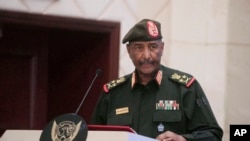 FILE - Sudan's Army chief Gen. Abdel-Fattah Burhan speaks in Khartoum, Sudan, on Dec. 5, 2022.