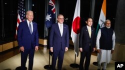 From left: U.S. President Joe Biden, Australian Prime Minister Anthony Albanese, Japanese Prime Minister Fumio Kishida, and Indian Prime Minister Narendra Modi pause for a photo during the G-7 summit in Hiroshima, Japan, May 20, 2023.