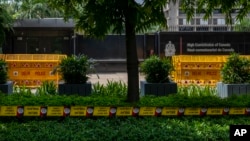 A police barricade tape is placed around the Canadian High Commission in New Delhi, Sept. 19, 2023.