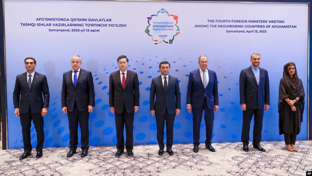 The foreign ministers of Turkmenistan, Tajikistan, China, Uzbekistan, Russia, Iran and Pakistan, all neighbors of Afghanistan, are pictured at their meeting in Samarkand, Uzbekistan, April 13, 2023. (Russian Foreign Ministry Press Service via AP)
