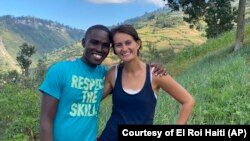 In this undated photo provided by El Roi Haiti, Alix Dorsainvil, right, poses with her husband, Sandro Dorsainvil. Alix Dorsainvil, a nurse for El Roi Haiti, and her daughter were kidnapped on July 27, the organization said.