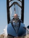 US Air Force Secretary Frank Kendall sits in the front cockpit of an X-62A VISTA aircraft at Edwards Air Force Base, Calif., on May 2, 2024.