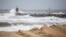 Waves break along the jetty at Rudee Inlet in Virginia Beach, Virginia, Sept. 22, 2023, as Tropical Storm Ophelia approaches the area.