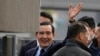 Former Taiwan President Ma Ying-jeou waves as he arrives at the Nanjing Massacre Memorial Hall in Nanjing in eastern China's Jiangsu Province, March 29, 2023. 