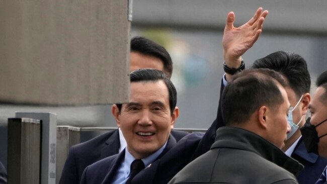 Former Taiwan President Ma Ying-jeou waves as he arrives at the Nanjing Massacre Memorial Hall in Nanjing in eastern China's Jiangsu Province, March 29, 2023.