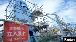 Seawater transfer pumps of the Fukushima Daiichi nuclear power plant are seen during a treated water dilution and discharge facility tour for foreign media, in Futaba town, northeastern Japan, Aug. 27, 2023.