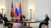FILE - Russia's President Vladimir Putin, Armenia's Prime Minister Nikol Pashinyan and Azerbaijan's President Ilham Aliyev attend a trilateral meeting in Sochi, Oct. 31, 2022. (Sputnik/Sergey Bobylev/Pool via Reuters) 
