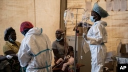 FILE - Health workers treat cholera patients at Bwaila Hospital in Lilongwe, Malawi, Jan. 11, 2023.