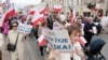Anti-abortion demonstrators march in support of every conceived life and against steps taken by the new government to liberalize Poland's strict law and allow termination of pregnancy until the 12th week, in Warsaw, April 14, 2024.
