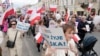 Polish abortion opponents march against steps to liberalize strict law  