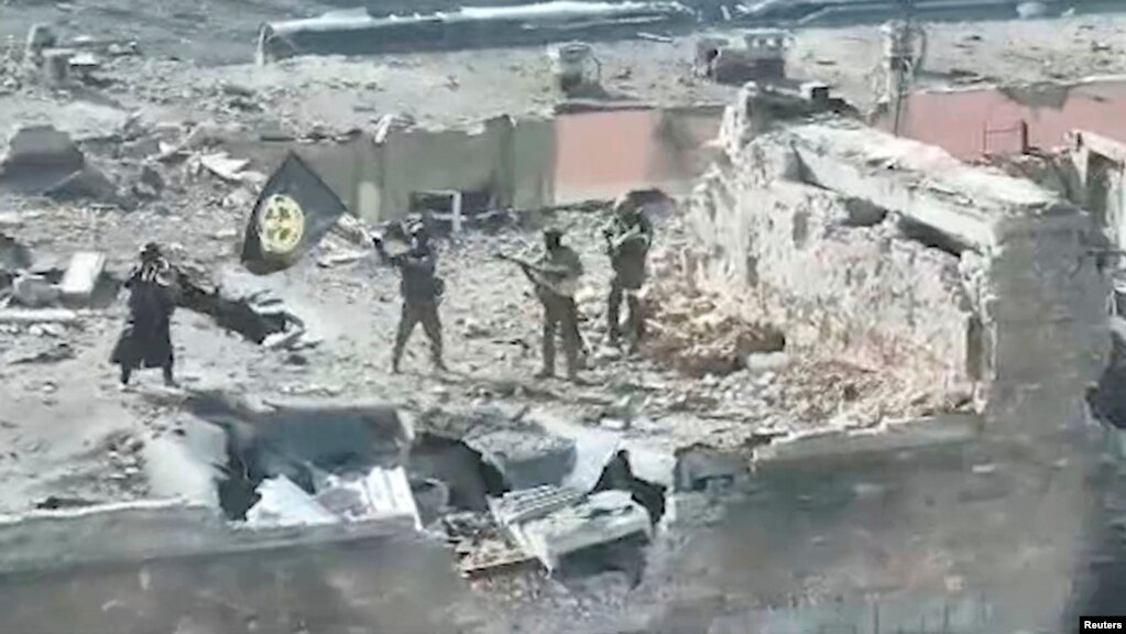 Відеокадр від "Групи Вагнера". Група заявляє, що на фото - бойовики Групи в Бахмуті в березні 2023 року. Роздатковий матеріал Reuters