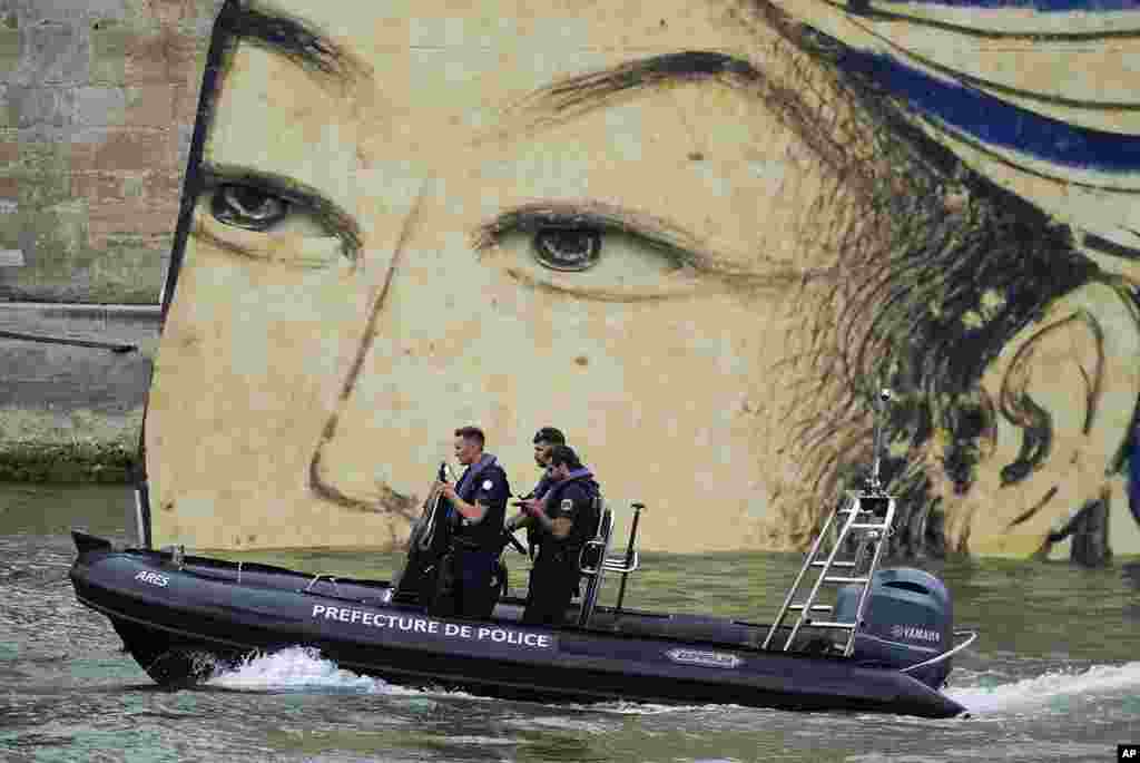 Security patrol by boat in Paris, France, before the opening ceremony of the 2024 Summer Olympics.