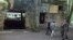 FILE - Tourists visit the ruins of Adolf Hitler's "Wolf's Lair" in Gierloz, Poland, July 17, 2004. Prosecutors have discontinued a probe of skeletons found there because decay made it impossible to determine a cause of death, a spokesman said May 6, 2024.