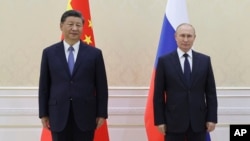 Rais wa China Xi Jinping, na rais wa Russia Vladimir Putin, wakati wa mkutano nchini Uzbekistan, Septemba 15, 2022