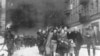 FILE - In this 1943 file photo, a group of Polish Jews are led away for deportation by German SS soldiers during the destruction of the Warsaw Ghetto. (AP Photo, File)