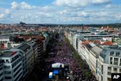 Thousands of people gathers to protest high inflation and to demand the government's resignation in Prague, Czech Republic, Apr. 16, 2023.