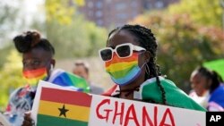 FILE —Wilhemina Nyarko attends a rally against a controversial bill being proposed in Ghana's parliament that would make identifying as LGBTQIA or an ally a criminal offense punishable by up to 10 years in prison, in the Harlem neighborhood of New York on October 11, 2021.