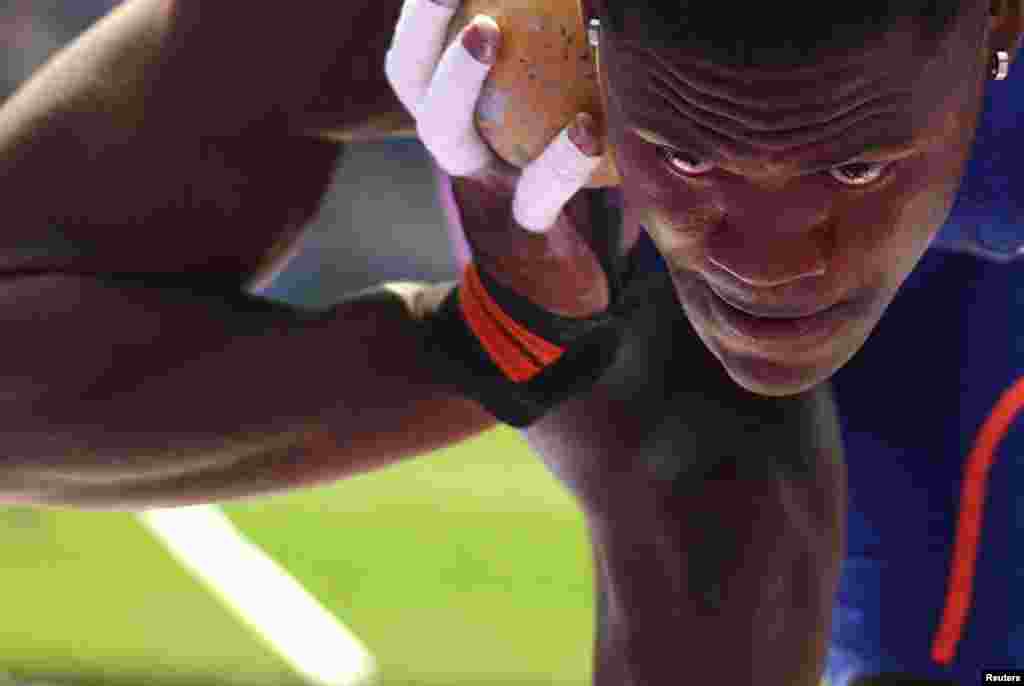 Makenson Gletty of France participates in the men's decathlon shot put at Stade de France, Saint-Denis, France, during the 2024 Olympic Games.