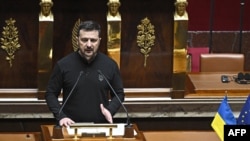 Ukraine's President Volodymyr Zelenskyy delivers a speech at the National Assembly in Paris on June 7, 2024.