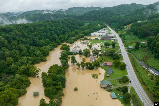 FILE - Homes and structures are flooded near Quicksand, Ky., July 28, 2022. (Ryan C. Hermens/Lexington Herald-Leader via AP, File)