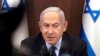 FILE - Israeli Prime Minister Benjamin Netanyahu chairs a weekly cabinet meeting at his office in Jerusalem, Aug. 27, 2023. Netanyahu arrived in the U.S. Sept. 18, 2023, for a meeting later in the week with President Joe Biden.
