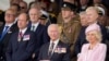 Britain's Prince William, from left, Britain's King Charles III and Queen Camilla attend a D-Day national commemoration event in Portsmouth, England, June 5, 2024.