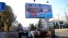 7일 우크라이나 동부 도네츠크주 러시아 점령지 지하보도 입구에 대형 지방선거 광고물이 게시돼 있다. 