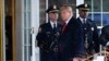 At Police Officer's Wake, Trump Seeks Contrast With Biden on Crime 