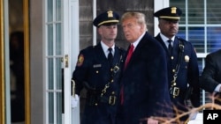 Former President Donald Trump arrives for the wake of New York City police officer Jonathan Diller, March 28, 2024, in Massapequa Park, N.Y. Diller was shot and killed Monday during a traffic stop, the city's mayor said.