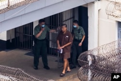 FILE - Jimmy Lai walks through the Stanley prison in Hong Kong, on July 28, 2023. U.S. Rep. Jamie Raskin says Lai was arrested for his criticism of the Chinese Communist Party through his work as a publisher and pro-democracy advocate.