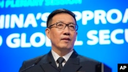 China's Defense Minister Dong Jun speaks during the 21st Shangri-La Dialogue summit at the Shangri-La Hotel in Singapore, June 2, 2024.