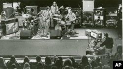 FILE - The Allman Brothers band perform in 1972 in front of a television audience. The musicians, from left are, Chuck Leavell, keyboard; Jamoie Johanson, drums; Dickey Betts, lead and slide guitar; Berry Oakley, bass; Butch Trucks, drums.