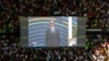 Rwanda President Paul Kagame is seen on screen moments after taking the oath of office in front of supporters during the Presidential Inauguration ceremony at the Amahoro stadium in Kigali, Aug. 11, 2024. 