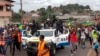 FILE - This image taken from video shows coup supporters cheering police officers in Libreville, Gabon, on Aug. 30, 2023.