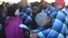 FILE— Mourners attend a mass funeral in Molepololefor, Gaborone, Botswana, May 4, 2024, for the 45 Botswana nationals who were killed in a bus crash in South Africa. 