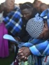 Mourners attend a mass funeral in Molepololefor, Gaborone, Botswana, May 4, 2024, for the 45 Botswana nationals who were killed in a bus crash in South Africa. 