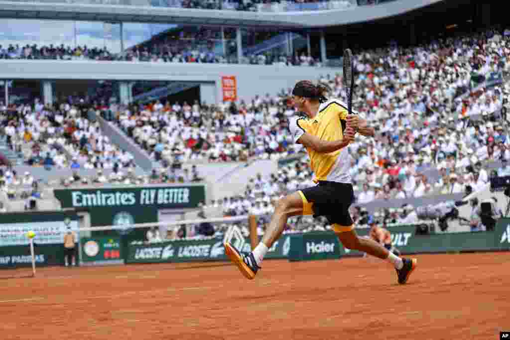 Germany&#39;s Alexander Zverev plays a shot against Spain&#39;s Carlos Alcaraz during the men&#39;s final of the French Open tennis tournament at the Roland Garros stadium in Paris, France.