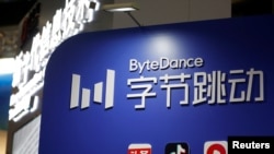 FILE - The logo of TikTok's parent company ByteDance is seen at its booth during an organized media tour to the Zhongguancun National Innovation Demonstration Zone Exhibition Center in Beijing, China, Feb. 10, 2022.