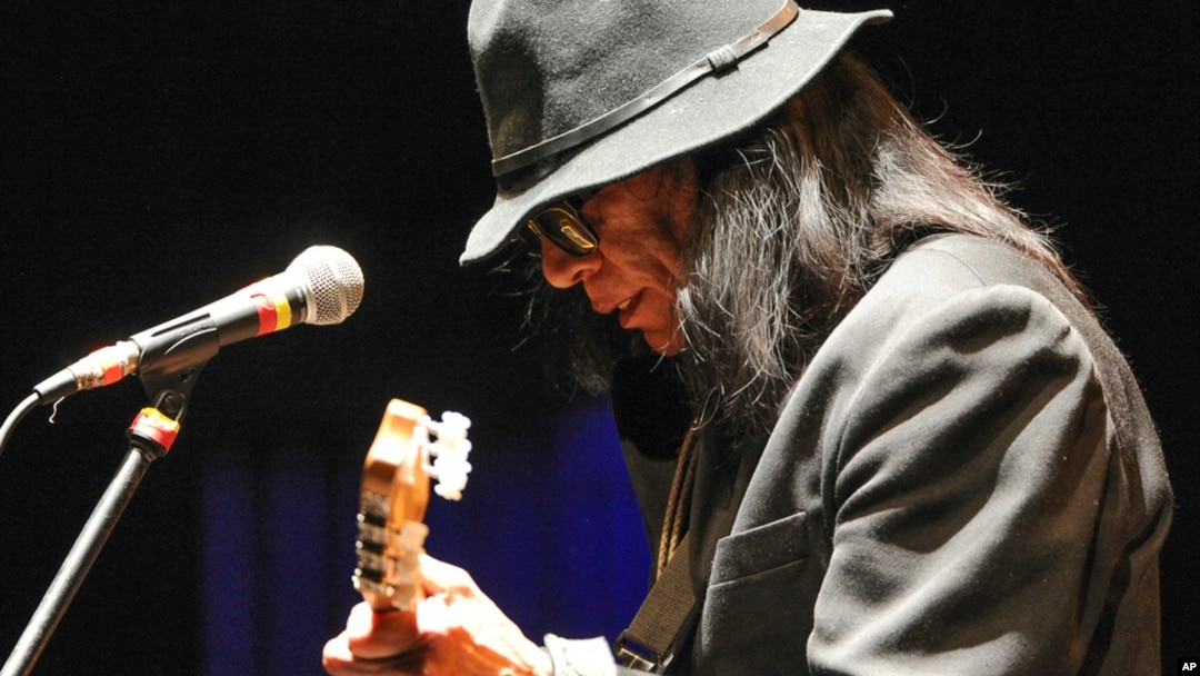 FILE - Singer-songwriter Sixto Rodriguez performs at the Beacon Theatre on April 7, 2013, in New York.