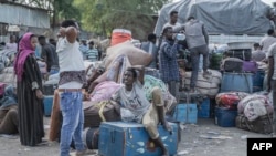 FILE: Refugees from Sudan rest in Metema, Ethiopia, on May 5, 2023. More than 15,000 people have fled Sudan via Metema since fighting broke out in Khartoum in mid-April, according to the UN's International Organization for Migration, with around a thousand newarrivals per day.