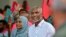 Maldives' main opposition candidate Mohamed Muiz participates in a rally as he concludes his campaign for the second round of presidential election in capital Male, Maldives, Sept.29, 2023.