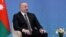 FILE - Azeri President Ilham Aliyev attends a meeting with Russian President Vladimir Putin in Astana, Kazakhstan, July 3, 2024. Aliyev pledged Saturday to help France's overseas territories secure independence.