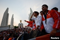 Move Forward Party leader and prime ministerial candidate Pita Limjaroenrat (white shirt) celebrates the party's election results in Bangkok, May 15, 2023.