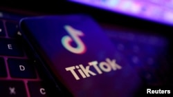 FILE - TikTok app logo is seen in this illustration created Aug. 22, 2022. 