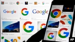 This file image shows various Google logos displayed on a Google search, Monday, Sept. 11, 2023, in New York. (AP Photo/Richard Drew, File)